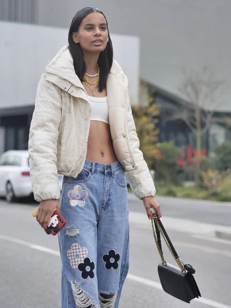 Model street style outfit after Prada fashion show during Milano fashionweek man collections 2022