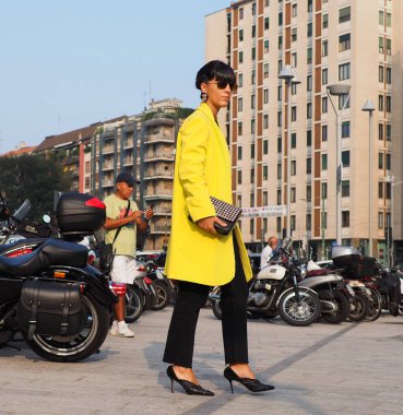 Fashion blogger posing for phtographers before Alberta Ferretti fashion show during Milano Fashion Week Women collections