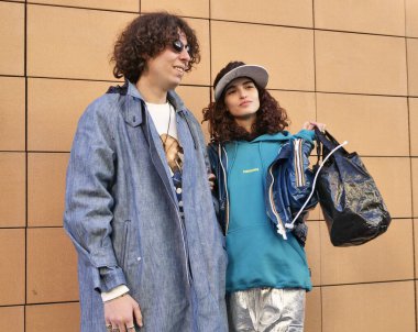 Top model Chiara Scelsi and friend posing for photographers after Magliano Fashion Show at Milan Fashion Week Fall/Winter man collections.