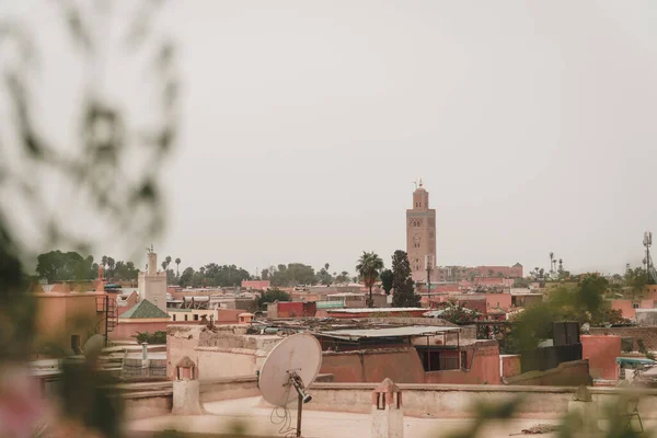 stock image Koutoubia Mosque in Marrakech, Morocco. View across the rooftops and buildings of Marrakesh. 2022 travel image of famous and popular holiday destination