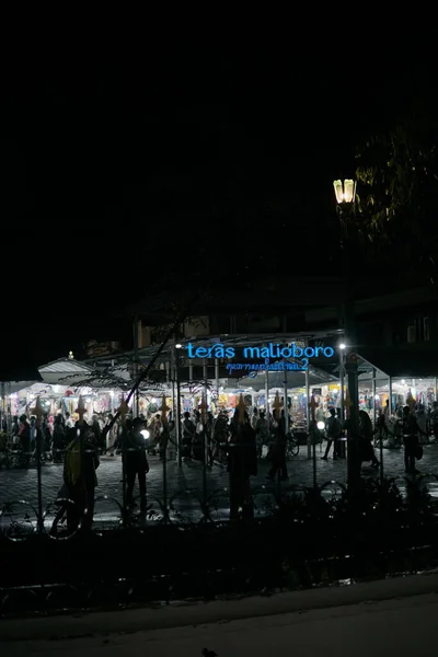 stock image the atmosphere of the Malioboro street in Yogyakarta is bustling and romantic at night. Jalan Malioboro is a favorite tourist attraction in Yogyakarta