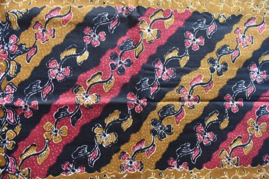 Batik kumaş motiflerinin renkli güzelliği tipik Pekalongan, Endonezya. Bu batik kumaş sargı ya da giysi için kullanılabilir..