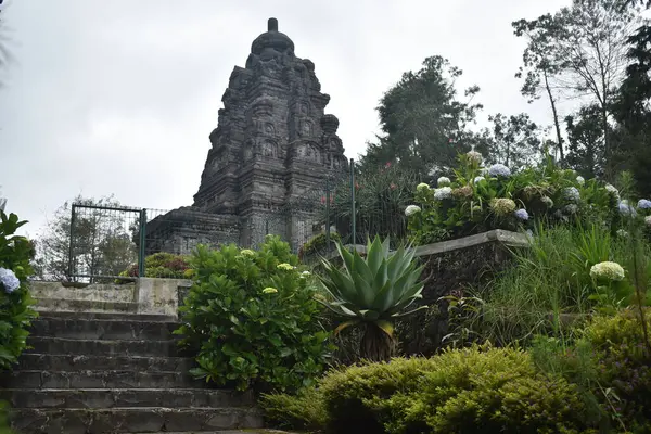 stock image Bima temple in Dieng, Central Java, Indonesia. This temple is a famous tourist attraction