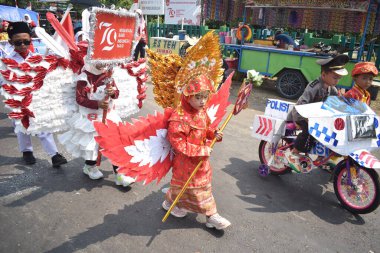 A cute children's carnival parade on Indonesian Independence Day and New Year, this parade contains elements of art. clipart