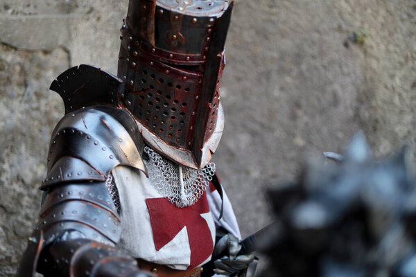 Lucca, Tuscany, Italy - October 30, 2022: Cosplayer dressed as Knight Templar, medieval warrior at the Lucca Comics and Games 2022 cosplay event.