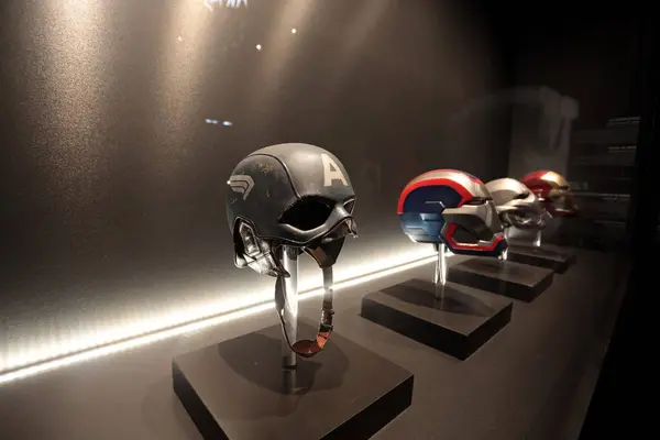 stock image Turin, Italy - June 29, 2024: Helmets of Marvel superheroes Captain America and Iron Man exhibited at the National Cinema Museum in Turin.