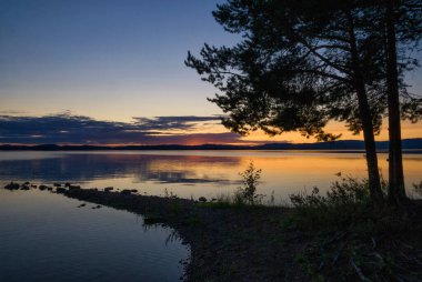 İsveçli şehrin Orsa ilçe Dalarna içinde Orsasjon göl günbatımı