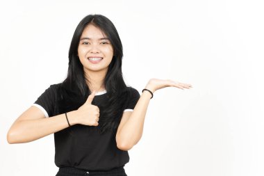 Showing and Presenting Product on Open Palm with Thumbs up Of Beautiful Asian Woman Isolated