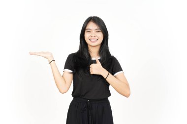 Showing and Presenting Product on Open Palm with Thumbs up Of Beautiful Asian Woman Isolated