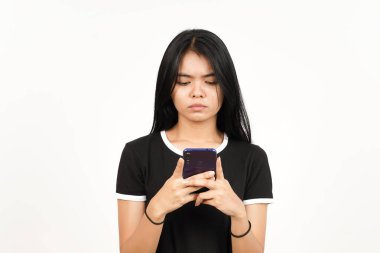 Holding or Using Smartphone with sad or angry face Of Beautiful Asian Woman Isolated On White
