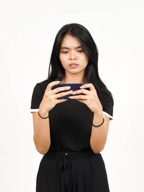 Playing Mobile Game on Smartphone With Losing Gesture Of Beautiful Asian Woman Isolated On White