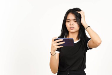 Playing Mobile Game on Smartphone With Losing Gesture Of Beautiful Asian Woman Isolated On White