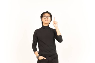 Showing Product and Pointing Up Of Handsome Asian Man Isolated On White Background