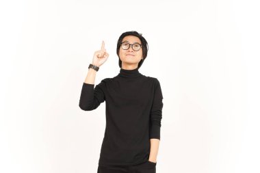Showing Product and Pointing Up Of Handsome Asian Man Isolated On White Background