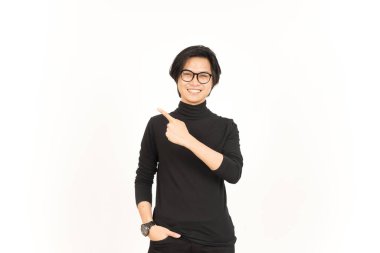 Showing Product and Pointing Side using forefinger Of Handsome Asian Man Isolated On White