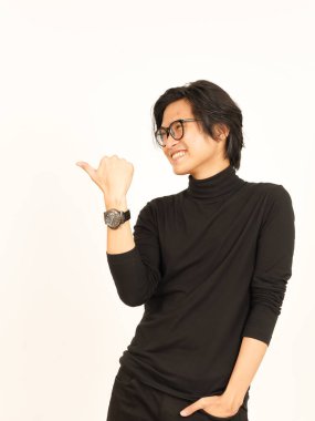 Presenting and Pointing Side Product Using Thumb Of Handsome Asian Man Isolated On White Background