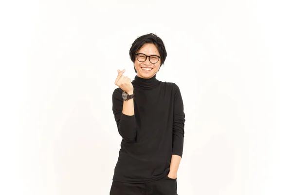 笑顔と白い背景に隔離されたハンサムなアジアの男の韓国の愛の指を示す — ストック写真