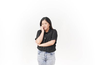 beautiful Asian woman looks scared, worried, and nervous, her expression full of anxiety against a white background