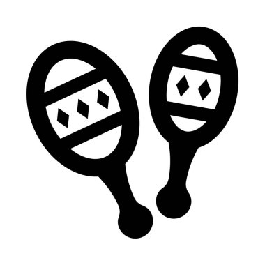 Üzerinde bandaj olan iki siyah beyaz marakas.