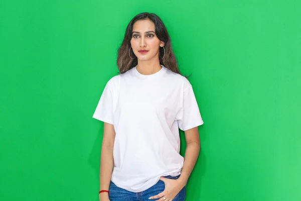 Image of a woman posing wearing her white blank shirt for mockup