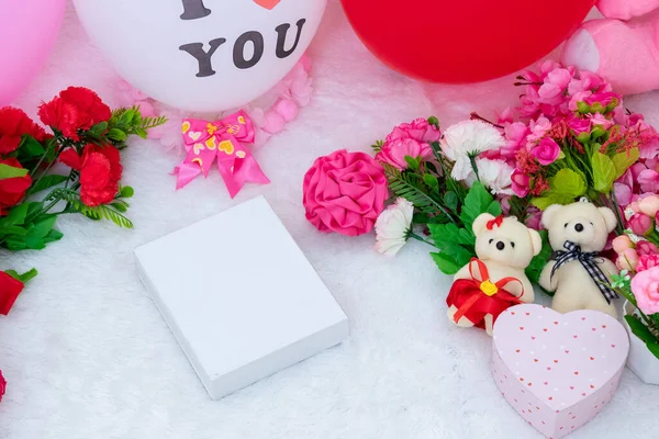White Blank Rectangle Box Fluffy White Carpet Surrounded Valentine Themed Foto Stock