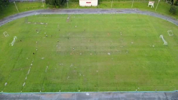 Aerial Footage Football Player Playing Football Messy Stadium Taken Drone — Stock Video