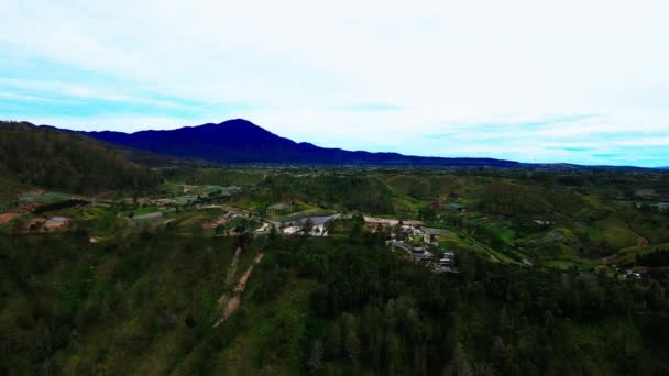 Tranquil Aerial Views Capture Charm Serene Village Settled Amidst Hills — Stock Video