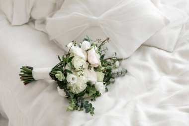 Bride's bouquet with white flowers. Wedding ceremony.