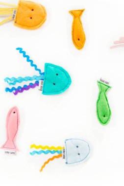 Cute handmade cat toys isolated on white