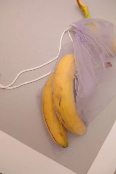 Bananas in eco friendly net bag