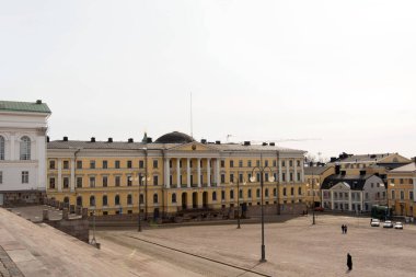 Beautiful buildings in a wide square. Helsinki downtown. Finland