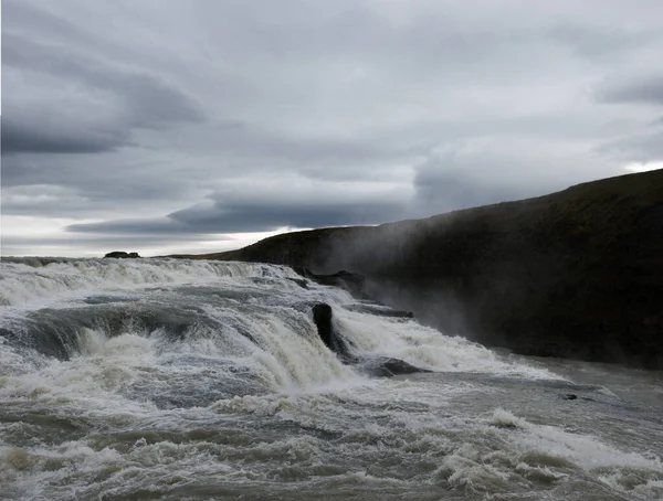 stock image Gulfoss consists on two waterfalls with a total height of 31 meters and a depth of 70 meters.