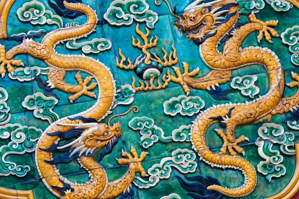 stock image Chinese decoration pattern. Two yellow dragons, green background. Pattern