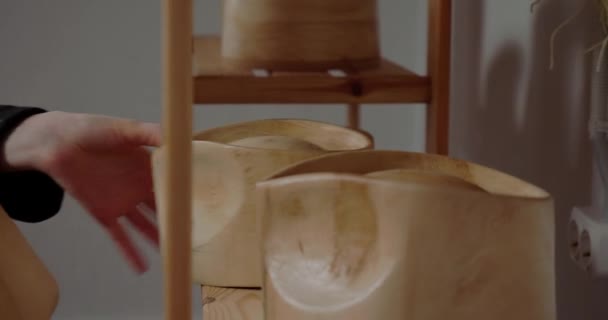 Woman Stacks Wooden Molds Making Hats Shape Shelf Professional Milliner — стоковое видео