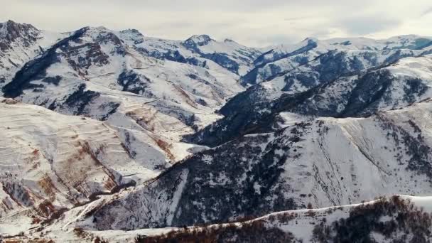 White Snow Lies Steep Slopes Caucasus Mountain Pass Cloudy Sky — Wideo stockowe