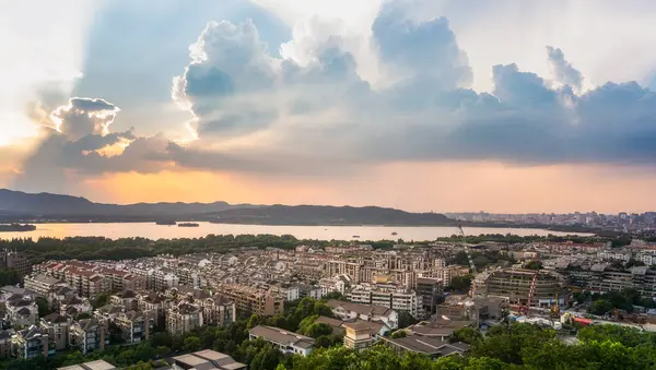 stock image Overlooking Hangzhou West Lake in the setting su