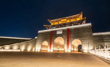 Night view of the old pier at Dongguankou, Suqian, China clipart