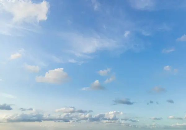 stock image Looking up at the blue sky and white clouds background