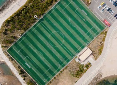 Football field on the reef of Qingdao Island, China clipart