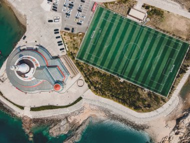 Football field on the reef of Qingdao Island, China clipart