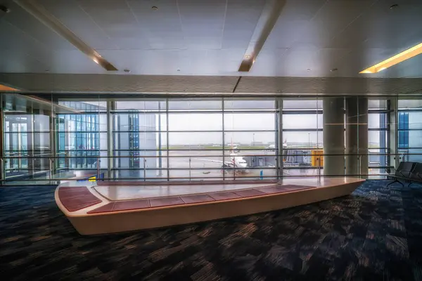 stock image Airport terminal waiting hall and floor-to-ceiling glass windows