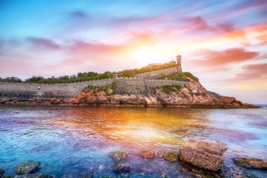 Penglai Pavilion, a famous sea mountain in Yantai, China clipart