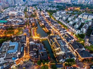 Aerial photography night view of ancient buildings on the Qinhua clipart