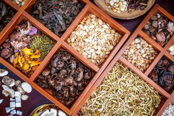 stock image Chinese herbal medicine and flower tea on wooden