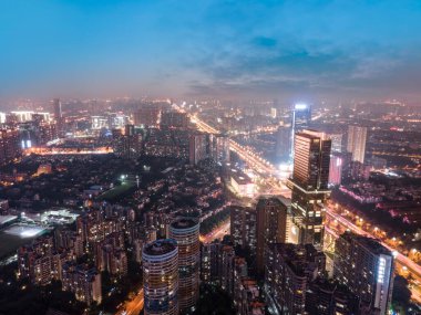 Aerial photography night view of modern buildings in Chengdu Hig clipart