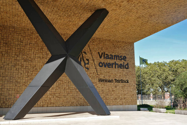 Closeup on the big X-cross on the Herman Teirlinck building of the Flemish government on environment at Tour and Taxis