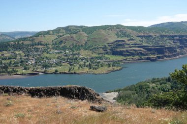 Scenic wide and high angle view on the Columbia river gorge valley from the Rowena ctrest viewpoint in Oregon clipart