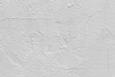Çatlak beton duvar gri çimento arka planla kaplı.
