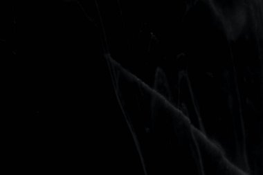 Çizikleri olan güzel desenli siyah mermer arka plan, tasarım için kullanılıyor..