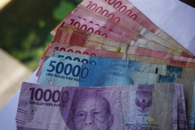 Endonezya 'nın resmi para birimi olan Endonezya rupiasının stok fotoğrafı. Para yardımı teması için uygun